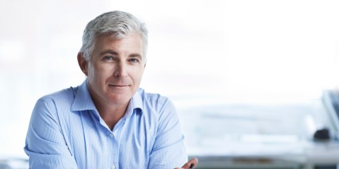 o-older-businessman-in-office-facebook